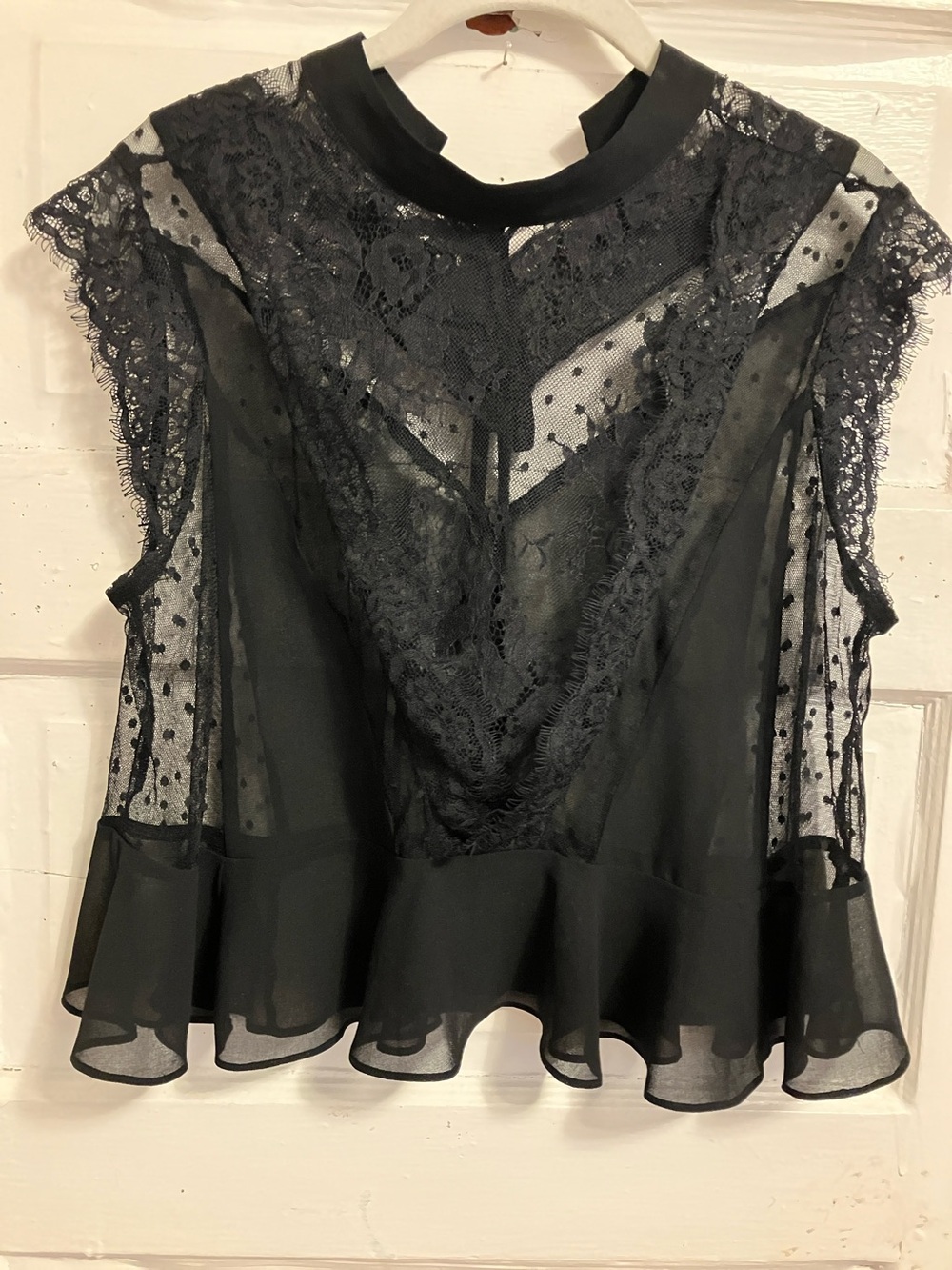 Used , but like new. Sz L. Bust to 36”-37”. Sheer black chiffon with black lace